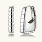 Close-up of platinum-plated sterling silver hoop earrings with horizontal textured grooves on white background.